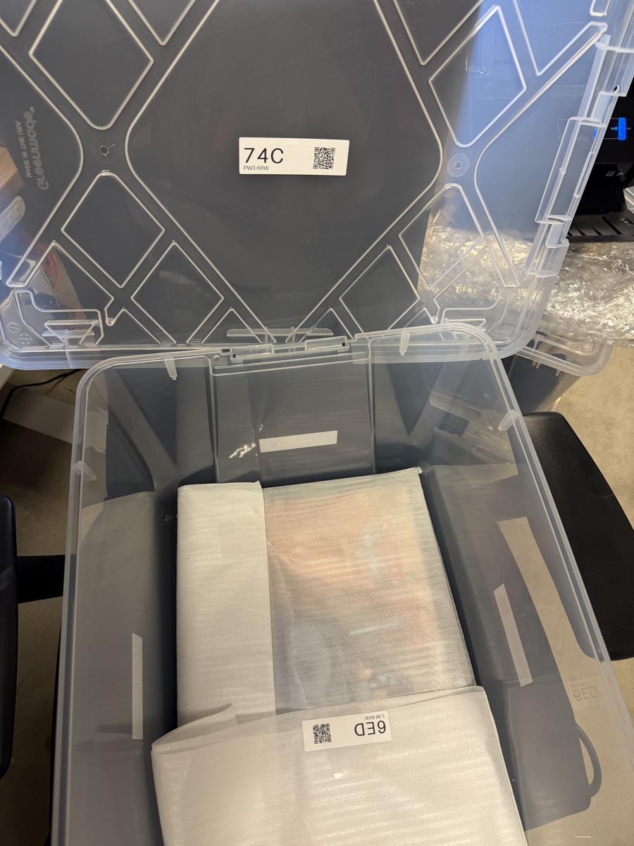 The foam sleeve labeled 6ED inside the open box, with box label 74C visible on the lid.